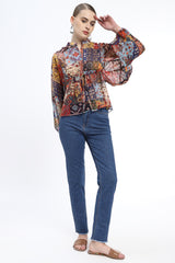 Chiffon top with elasticated waist and sleeve detail. Stand collar in waist length top.